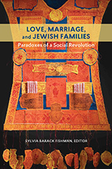 Book Cover: Love, Marriage, and Jewish Families (on a yellow stripe). Paradoxes of a Social Revolution. Sylvia Barack Fishman, Editor. Cover Art is a collage of patterns, shapes, Hebrew text (including several small scrolls tucked into 2 pockets) and symbols (fish and a Hamsa), all in shades of orange, yellow and blue. 15 circles and fish hang on strings below the main part of this work. It is in the shape of a vest.