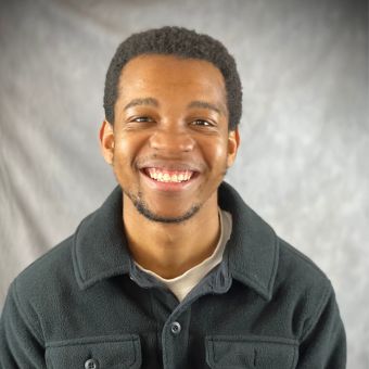 Thabang Matona smiles in his headshot